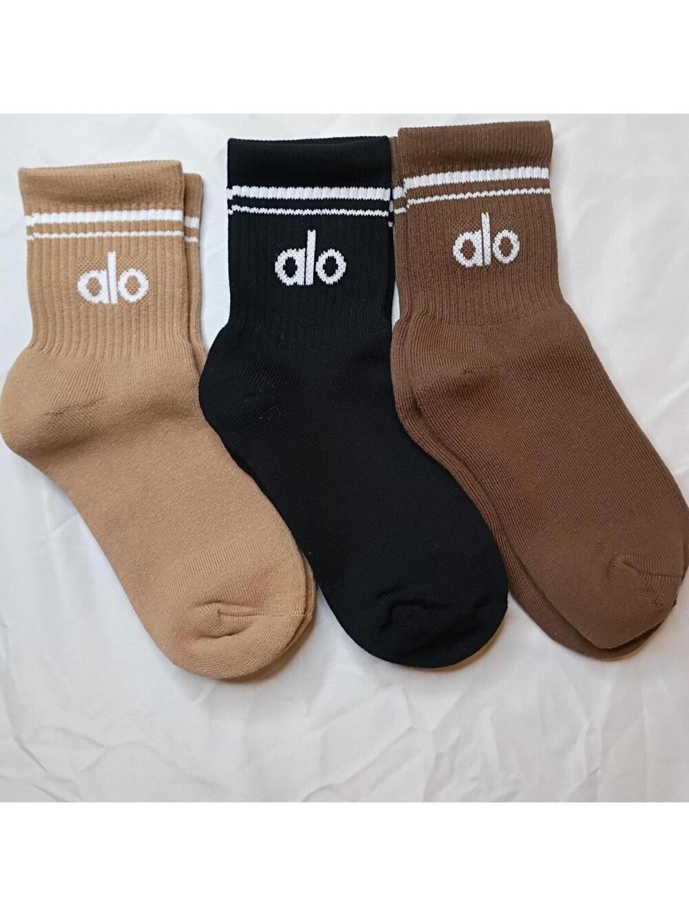Alo Yoga Women's half crew throwback black nd Brown Sock